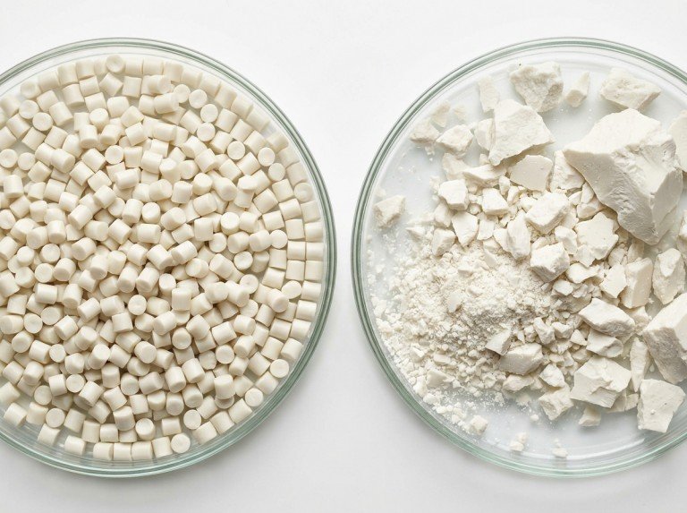 Two petri dishes comparing uniform resin pellets against irregular mixed-size plastic particles